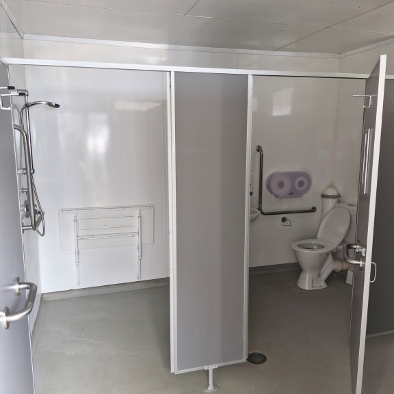 The bathroom with disability access, often used by teachers/adults